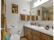 Clean bathroom with a wood vanity and marble top at 1531 Harbour Oaks Rd, Tucker, GA 30084