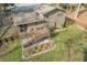 Elevated view of house with deck, fenced yard, and landscaping at 1531 Harbour Oaks Rd, Tucker, GA 30084