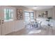 Bright dining area with a white table and four chairs at 3814 Whaley Ct, Snellville, GA 30039