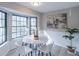 Bright dining area with a round marble table and white chairs at 3814 Whaley Ct, Snellville, GA 30039