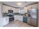 Modern kitchen with stainless steel appliances and granite countertops at 3814 Whaley Ct, Snellville, GA 30039