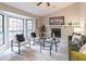 Living room with a fireplace and plenty of natural light at 3814 Whaley Ct, Snellville, GA 30039