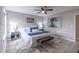 Main bedroom with ceiling fan and stylish decor at 3814 Whaley Ct, Snellville, GA 30039