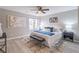 Spacious main bedroom with ceiling fan and stylish decor at 3814 Whaley Ct, Snellville, GA 30039