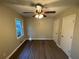 Bright bedroom with ceiling fan and hardwood floors at 1959 Bandera Dr, Decatur, GA 30032