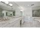 Elegant bathroom with marble finishes and double vanity at 750 Park Ne Ave # 13W, Atlanta, GA 30326