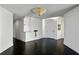 Bright entryway with dark hardwood floors and built-in shelving at 750 Park Ne Ave # 13W, Atlanta, GA 30326