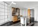 Modern kitchen with stainless steel appliances and a center island at 750 Park Ne Ave # 13W, Atlanta, GA 30326