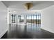 Spacious living room with dark hardwood floors and floor to ceiling windows at 750 Park Ne Ave # 13W, Atlanta, GA 30326