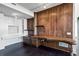 Home office with wood wall and custom desk at 750 Park Ne Ave # 13W, Atlanta, GA 30326