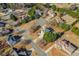 Bird's-eye view of community showcasing mature trees, well-manicured lawns, and neighborhood pool at 1019 Walnut Creek Dr, Woodstock, GA 30188