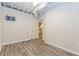 Basement bedroom with modern flooring, neutral color scheme, and a view into another room at 1019 Walnut Creek Dr, Woodstock, GA 30188