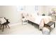 Cozy bedroom with neutral colors, decorative pillows, and natural light creating a serene and relaxing atmosphere at 4001 Red Oak Dr, Atlanta, GA 30340