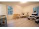 Charming Bedroom with crib, teepee, and cozy chair, perfect for a welcoming and comforting space at 4001 Red Oak Dr, Atlanta, GA 30340