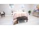 Cozy bedroom with neutral colors, decorative pillows, and natural light creating a serene and relaxing atmosphere at 4001 Red Oak Dr, Atlanta, GA 30340