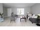 Inviting living room with large window, comfortable seating, and modern decor for a relaxing atmosphere at 4001 Red Oak Dr, Atlanta, GA 30340