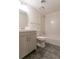 Updated bathroom featuring a vanity and tiled floor at 1472 Silver Maple Sw Ct, Lilburn, GA 30047