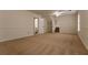 Spacious bedroom with neutral walls and carpet at 1472 Silver Maple Sw Ct, Lilburn, GA 30047