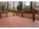 Spacious deck overlooks a wooded backyard at 1472 Silver Maple Sw Ct, Lilburn, GA 30047