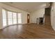 Living room with bay window and hardwood floors at 1472 Silver Maple Sw Ct, Lilburn, GA 30047