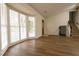 Living room with hardwood floors and bay window at 1472 Silver Maple Sw Ct, Lilburn, GA 30047