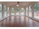 Sunroom boasts terracotta tile floors and ample natural light at 1472 Silver Maple Sw Ct, Lilburn, GA 30047