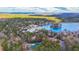 Aerial view showcasing a lakefront community and surrounding landscape at 2158 Belcourt Dr, Villa Rica, GA 30180