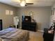 Cozy bedroom with dresser and TV at 2158 Belcourt Dr, Villa Rica, GA 30180