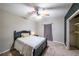 Comfortable bedroom with ceiling fan and walk-in closet at 2158 Belcourt Dr, Villa Rica, GA 30180
