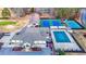 Aerial view of community clubhouse, pool, and tennis courts at 2158 Belcourt Dr, Villa Rica, GA 30180