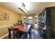 Bright dining room with hardwood floors, large windows, and a built-in hutch at 2158 Belcourt Dr, Villa Rica, GA 30180
