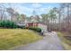 Brick ranch home nestled in a wooded setting at 2158 Belcourt Dr, Villa Rica, GA 30180