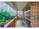 Inviting front porch with wooden railing and seating at 2158 Belcourt Dr, Villa Rica, GA 30180