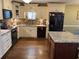 Updated kitchen featuring granite countertops and stainless steel appliances at 2158 Belcourt Dr, Villa Rica, GA 30180