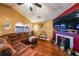 Spacious living room with hardwood floors and a large sectional sofa at 2158 Belcourt Dr, Villa Rica, GA 30180
