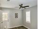 Bedroom with exterior access and ceiling fan at 1040 Hillsborough Chase Nw, Kennesaw, GA 30144