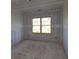 Unfinished bedroom with drywall and a window at 1975 Sage Lake Bend Sw, Marietta, GA 30064