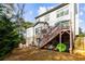 Large backyard with deck, stairs, and play area at 370 Park Ne Pl, Atlanta, GA 30317