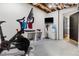 Basement home gym with Peloton bike and weights at 370 Park Ne Pl, Atlanta, GA 30317