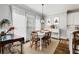 Bright breakfast nook with white table and hardwood floors at 370 Park Ne Pl, Atlanta, GA 30317