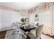 Elegant dining room with a large table, chandelier, and stylish curtains at 370 Park Ne Pl, Atlanta, GA 30317