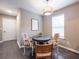 Charming dining area with round table and patterned chairs at 4948 Emmett Still Rd, Loganville, GA 30052