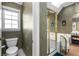 Main bathroom features a toilet and shower/tub combo at 705 Woodshire Sw Trl, Atlanta, GA 30331