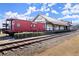 Historic train depot, now a restaurant, with caboose at 133 Pearl St, Woodstock, GA 30188