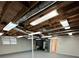 Unfinished basement features an open layout, exposed ceiling, and potential for customization at 3967 Evelyn Dr, Powder Springs, GA 30127