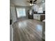 Bright kitchen boasts stainless appliances, black backsplash, and bay window for plenty of light at 3967 Evelyn Dr, Powder Springs, GA 30127