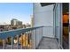 City views from a cozy balcony and a glimpse of the well-lit living space at 3324 Peachtree Ne Rd # 1503, Atlanta, GA 30326