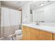 Bright bathroom featuring a modern vanity, white marble countertop, and shower with neutral accents at 3324 Peachtree Ne Rd # 1503, Atlanta, GA 30326