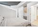 Cozy bedroom features bright walls, modern gray carpet, and an attached bathroom and desk at 3324 Peachtree Ne Rd # 1503, Atlanta, GA 30326