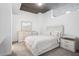 Bright bedroom featuring clean lines, modern gray carpet, and light-colored, high-quality furniture at 3324 Peachtree Ne Rd # 1503, Atlanta, GA 30326